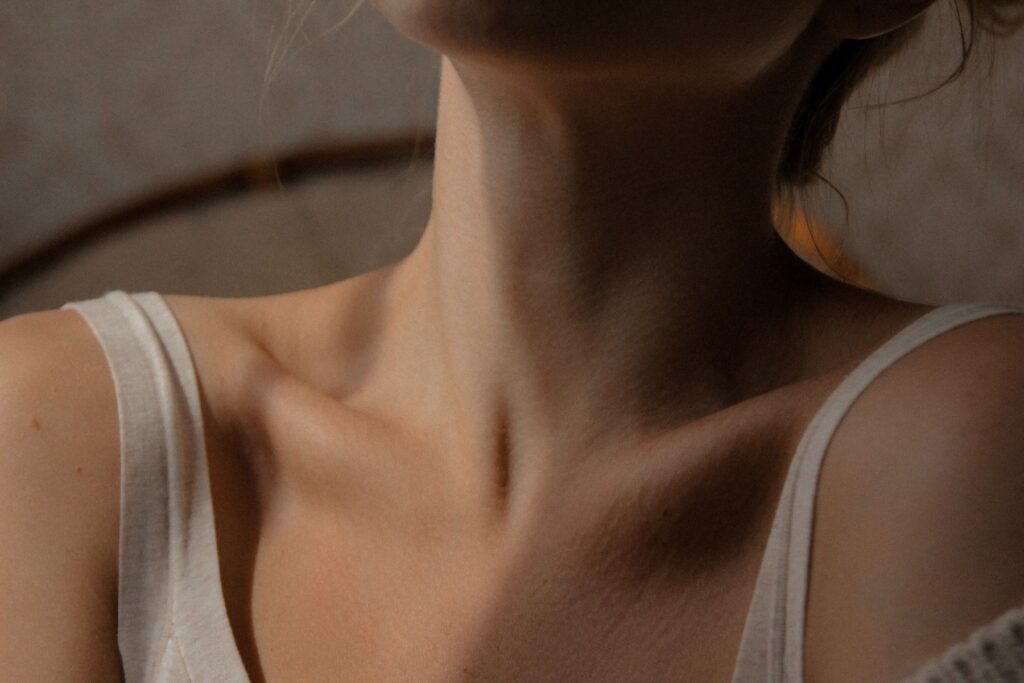 Neck and collarbone area of a woman