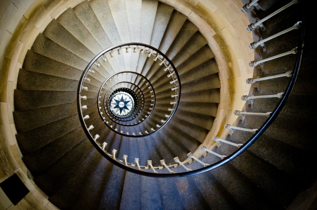 Looking down into a spiral staircase